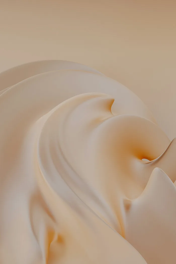 Textura de creme em close, em tons quentes